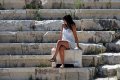 Γυναίκα σε μαρμάρινο έδρανο, Ακρόπολη, Αθήνα, Αττική